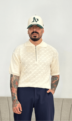 Polo strutturata con zip panna