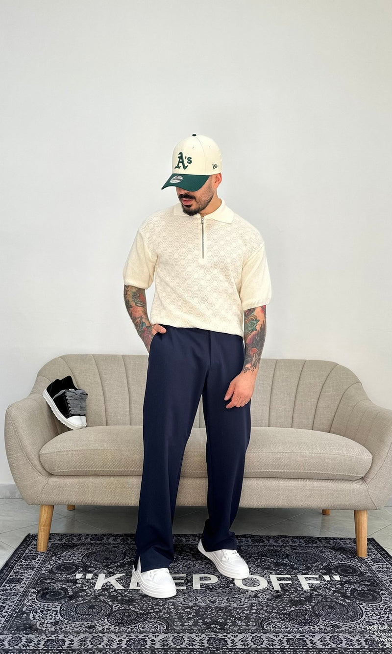 Polo strutturata con zip panna
