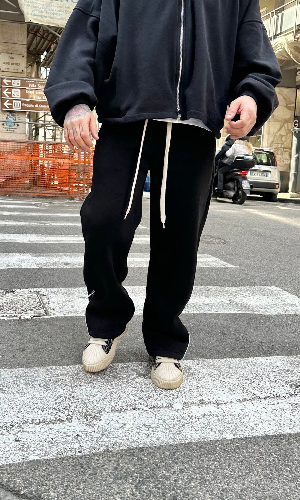 Panta tuta con zip black